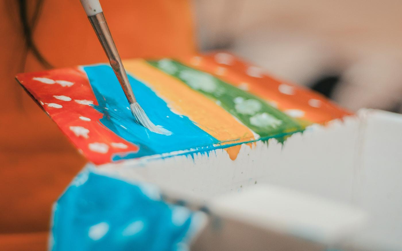 white and silver paint brush by Sandeep Singh courtesy of Unsplash.