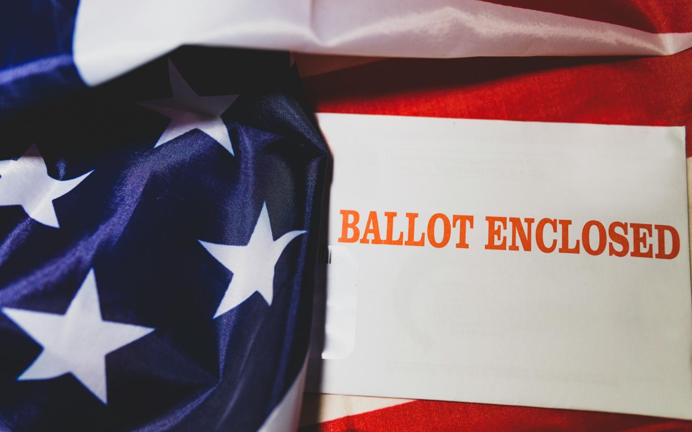 a close up of a piece of paper on a flag by Joshua Woroniecki courtesy of Unsplash.